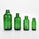 Green boston round glass bottles