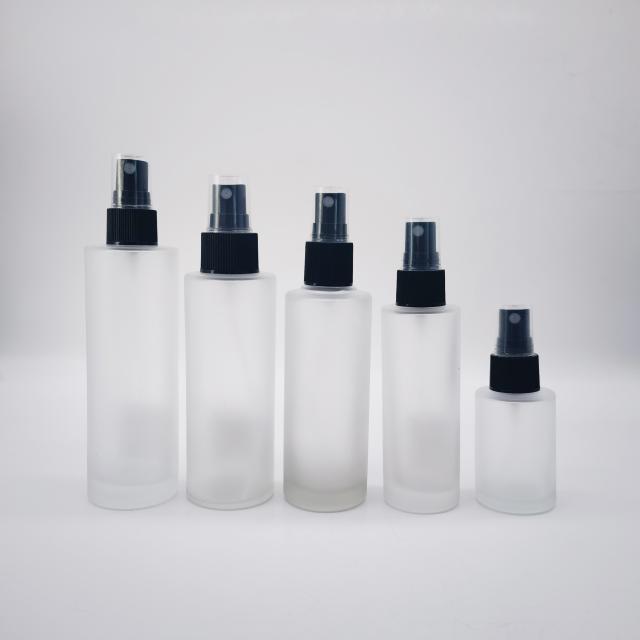 Round glass bottle for perfume with spray pump 30 / 60 / 85 / 100 / 120 ml