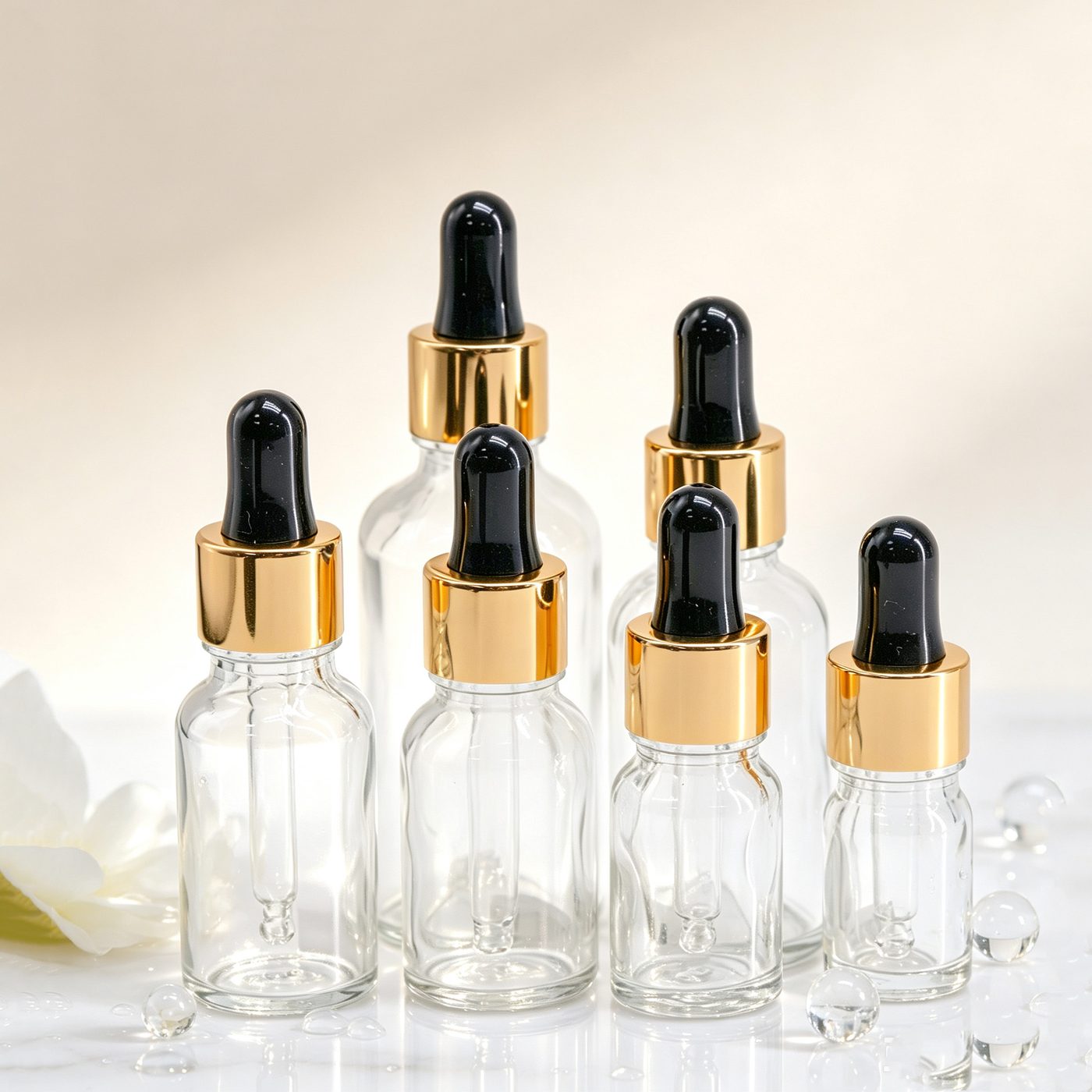 Clear essential oil bottle with gold dropper — 2