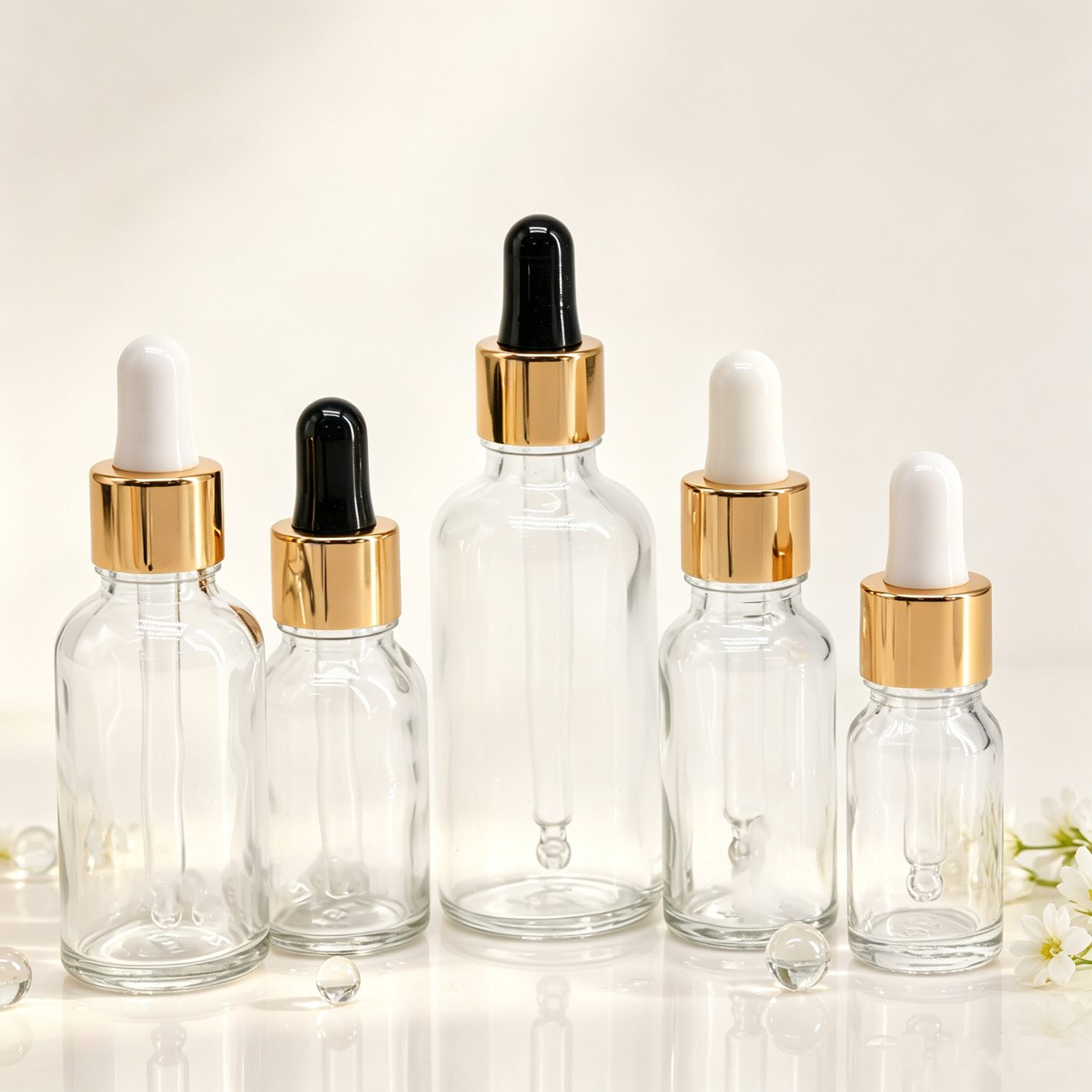 Clear essential oil bottle with gold dropper — 5